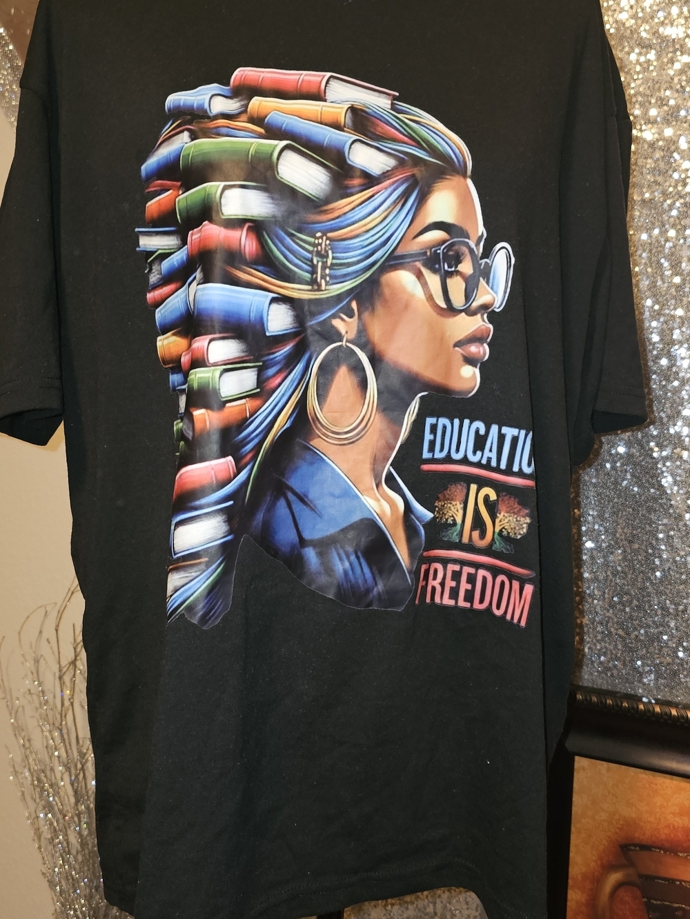 Black Graphic Tee "Education Is Freedom" with Colorful Book Hair